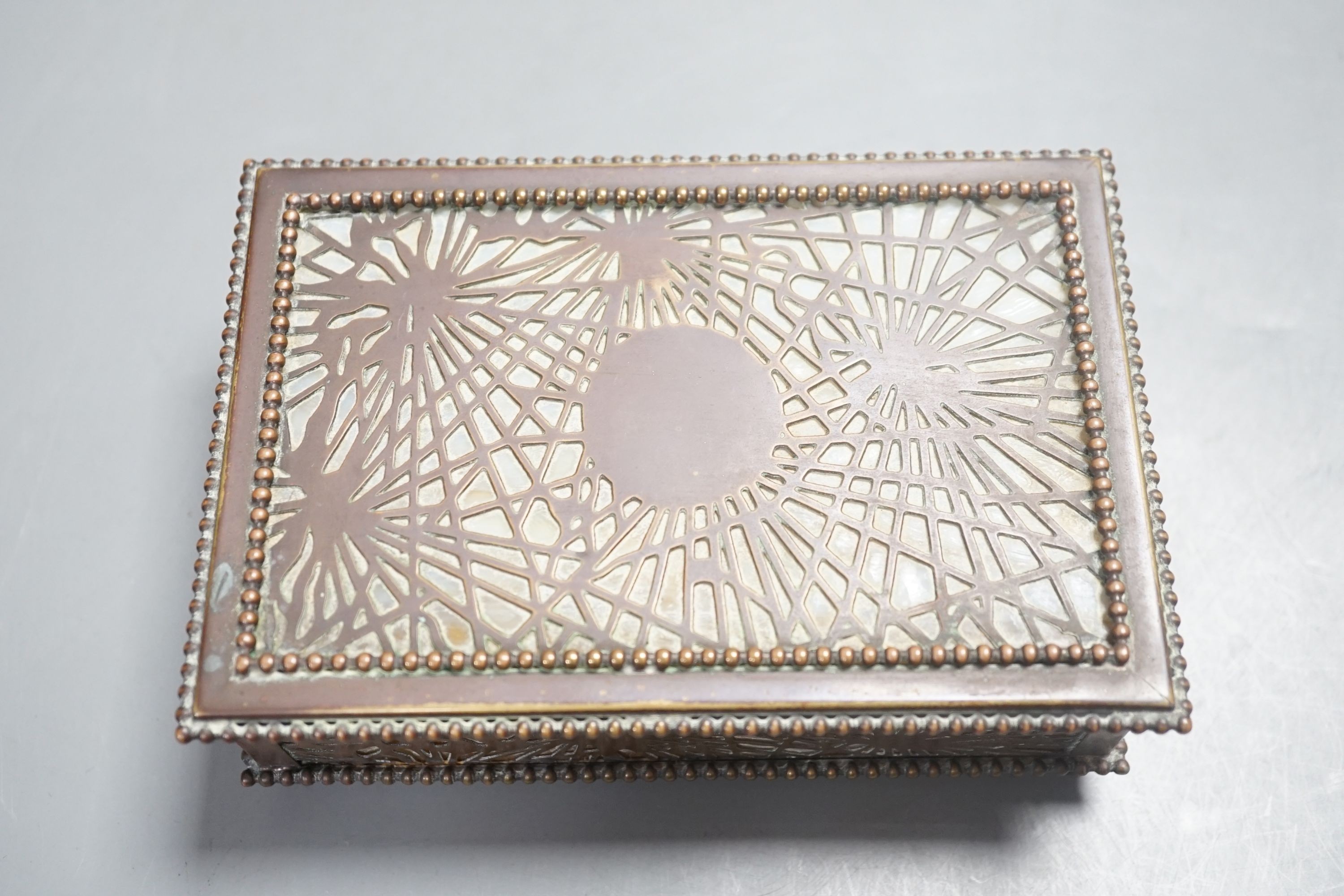 A Tiffany Studios box, pine needles pattern, 15 cms wide x 5cms high.